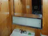Photo shows convenient half bath off the second bedroom in this Yosemite rental cabin